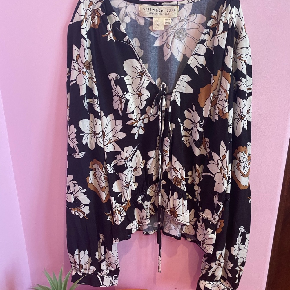 A blouse made by saltwater luxe. Only worn once.